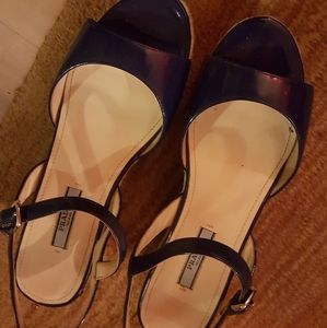 Size 7. Black Prada Wedges